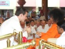 12. Swami materializes a beautiful pendant for one of the musicians of the Adult Choir